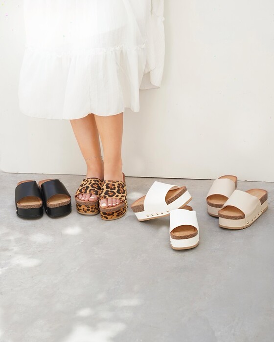 COMFORTABLE HIGH-SOLE SLIPPERS
